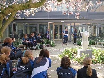 Year 8 English students perform plays inspired by A Midsummer Night's Dream under magnolia