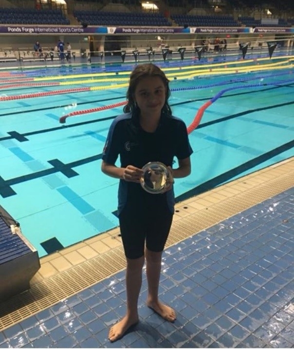 Young swimmer breaks records