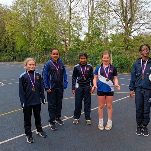 Nine games, nine wins: Junior School girls dominate Bee Netball Tournament!