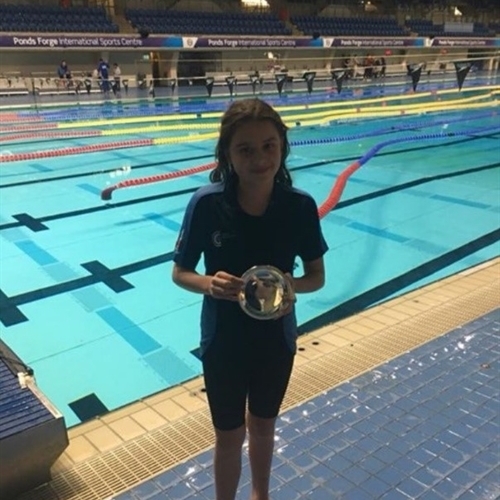 Young swimmer breaks records