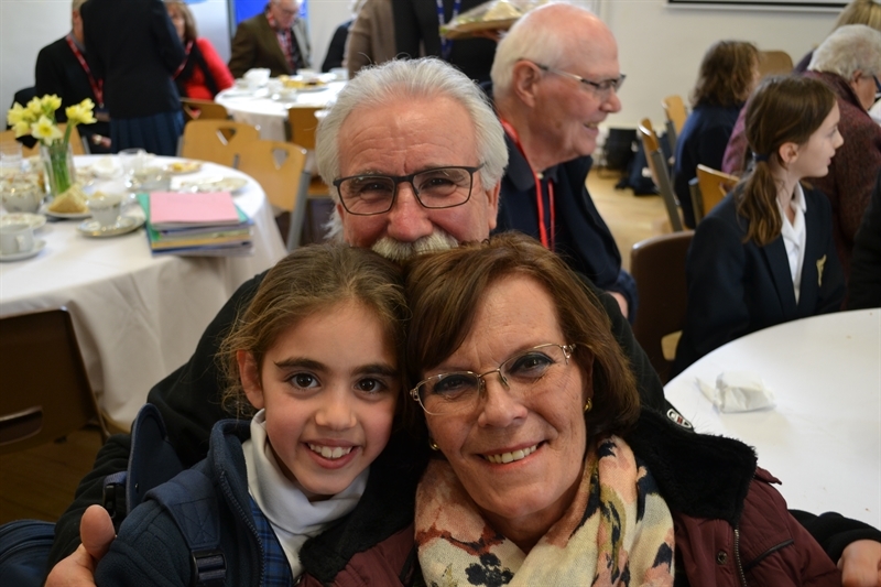 Girls joined by grandparents and relatives at Grandparents' Afternoon Tea