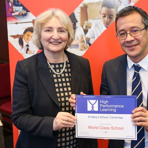Dr Flint represents St Mary's to collect World Class School Award